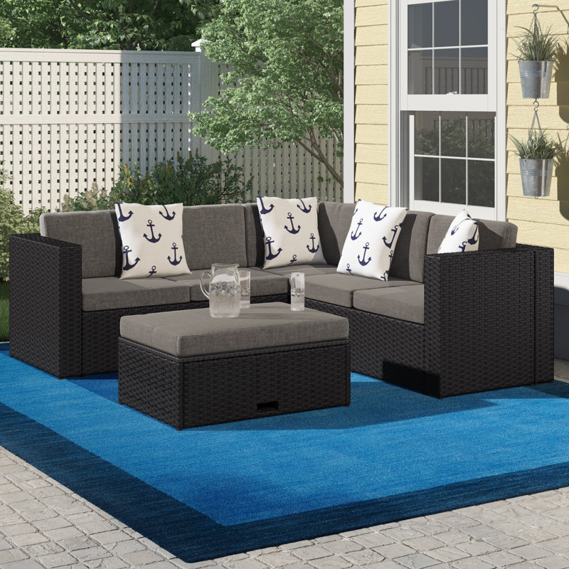 McNab 4 Piece Rattan Sectional Seating Group with Cushions Black